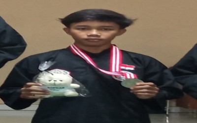 Naufal Zaqi Santoso XI TBSM A Raih Juara 3 POR Pelajar Cabang Pencak Silat.